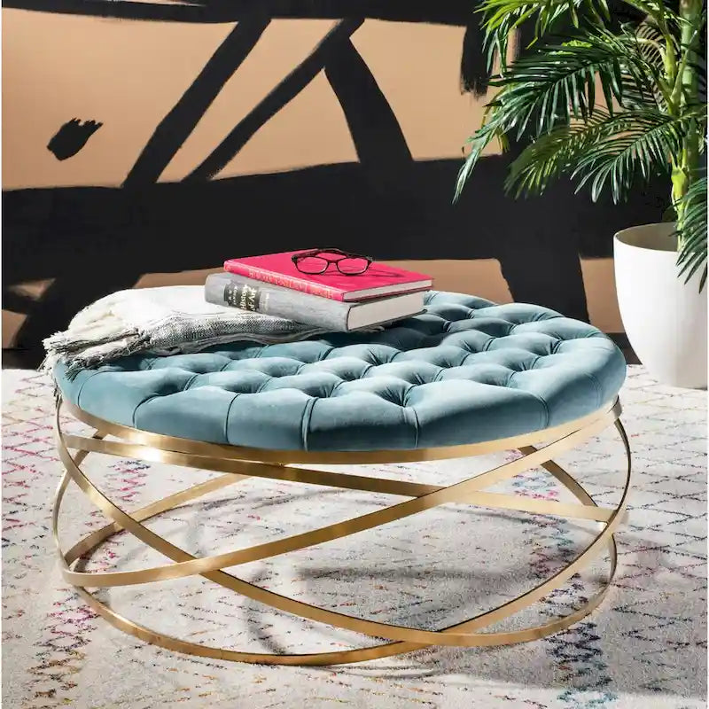 Pouf in velluto verde smeraldo trapuntato con struttura in metallo dorato